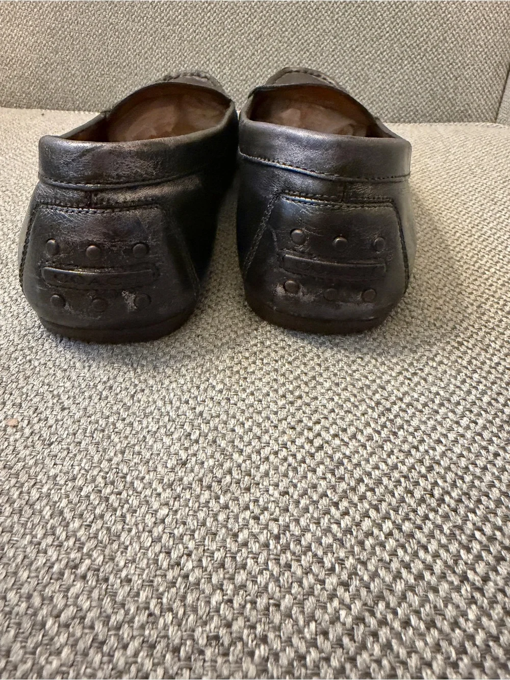 Coach women’s metallic pewter Leather Loafers